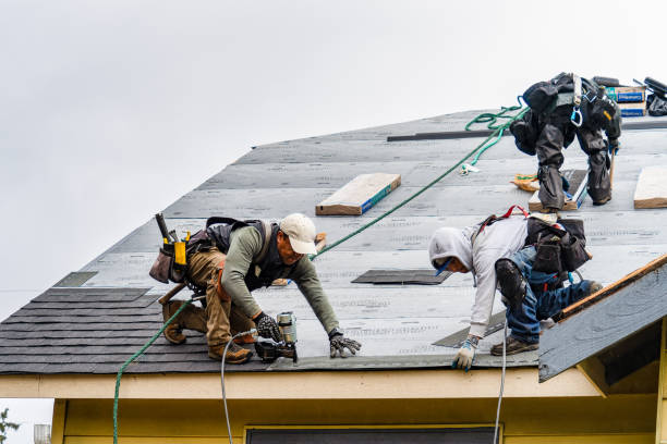 Professional Roofing technician working in East Poland, ME